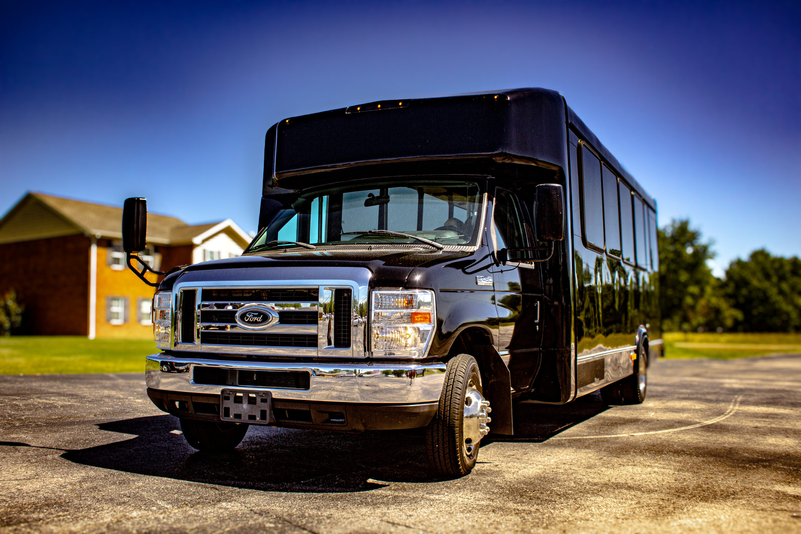 25-passenger mini coach bus operated by Meet In The Middle for group transportation in Middle Tennessee.